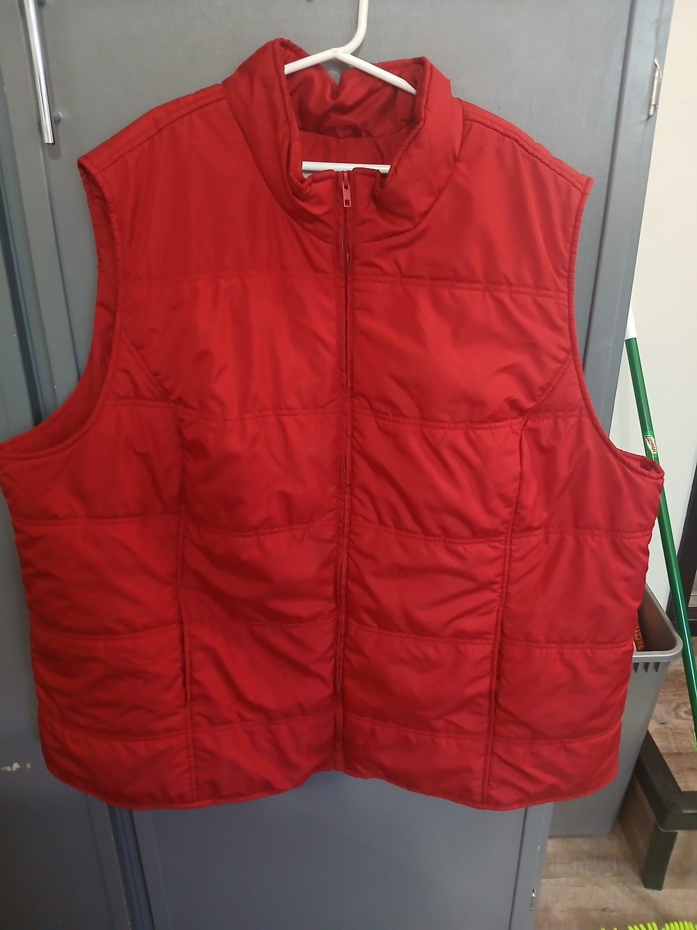 Woman Within Red Quilted Vest